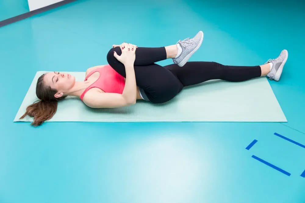 tuck knees exercise